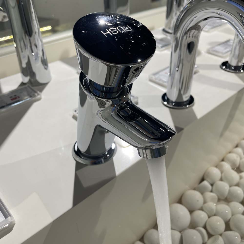 Vòi lavabo lạnh bán tự động TOTO DL102 - 5